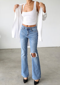 Distressed flare leg jeans