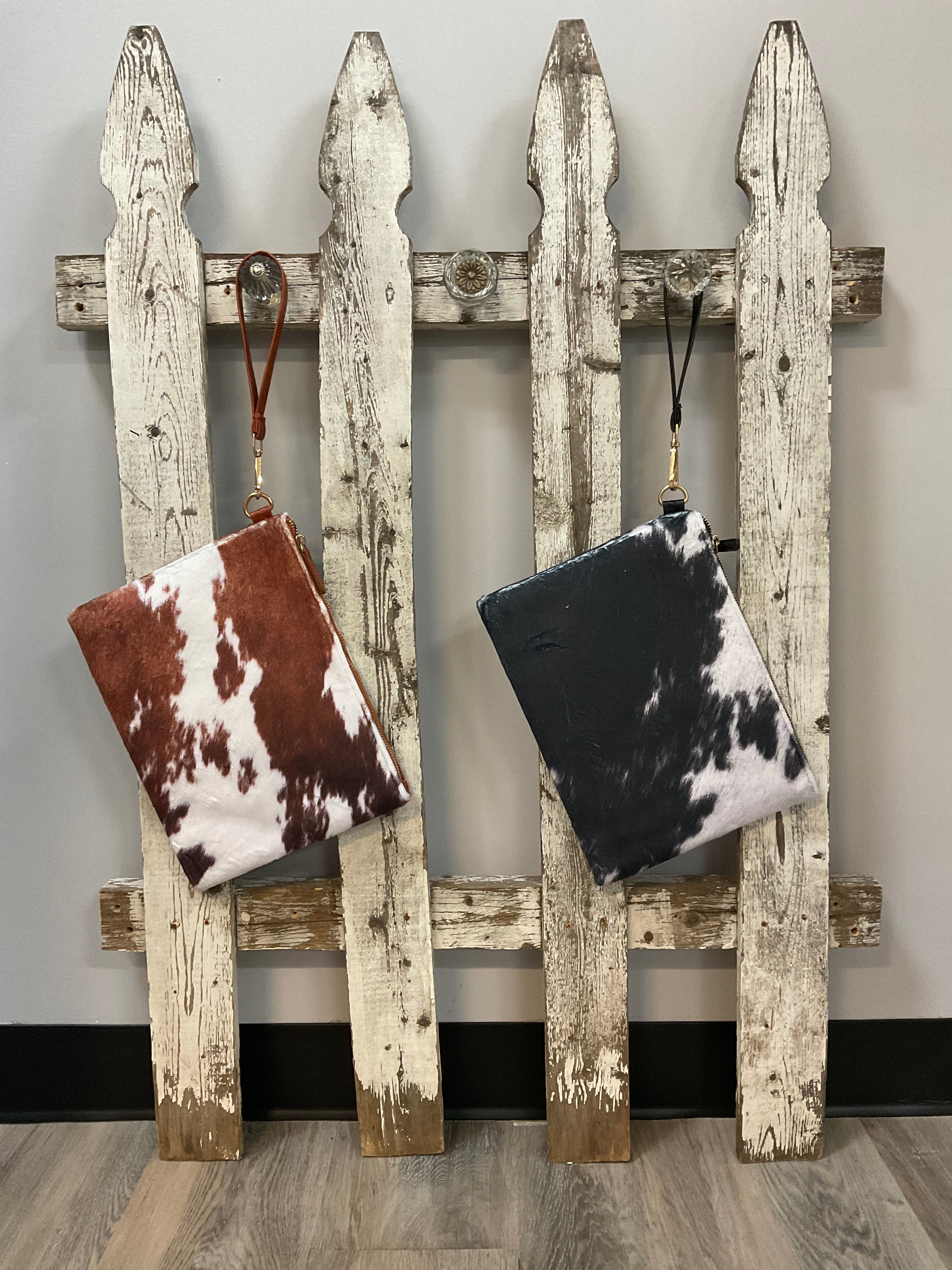 Faux cow hide wristlet clutch